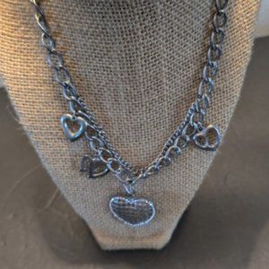 Charm Necklace outlined with faux rhinestones And several heart shaped charms